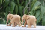 Handcrafted down trunk wooden elephant figurines – pair of showpieces